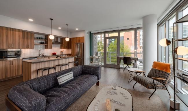 a living room with a couch and a table