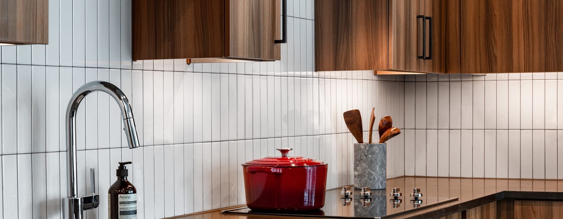 a kitchen with a sink and a faucet