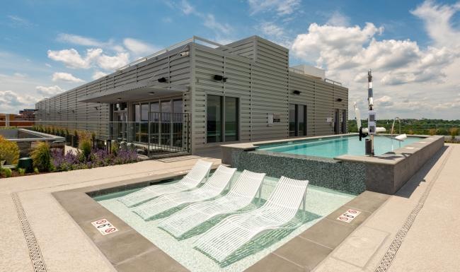 a building with a pool in front